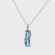 Load and play video in Gallery viewer, 14kt White Gold Blue Topaz Pendant
