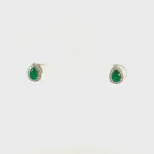 Load and play video in Gallery viewer, 18kt White Gold Emerald and  Diamond Earrings