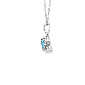 14kt White Gold Blue Topaz Pendant