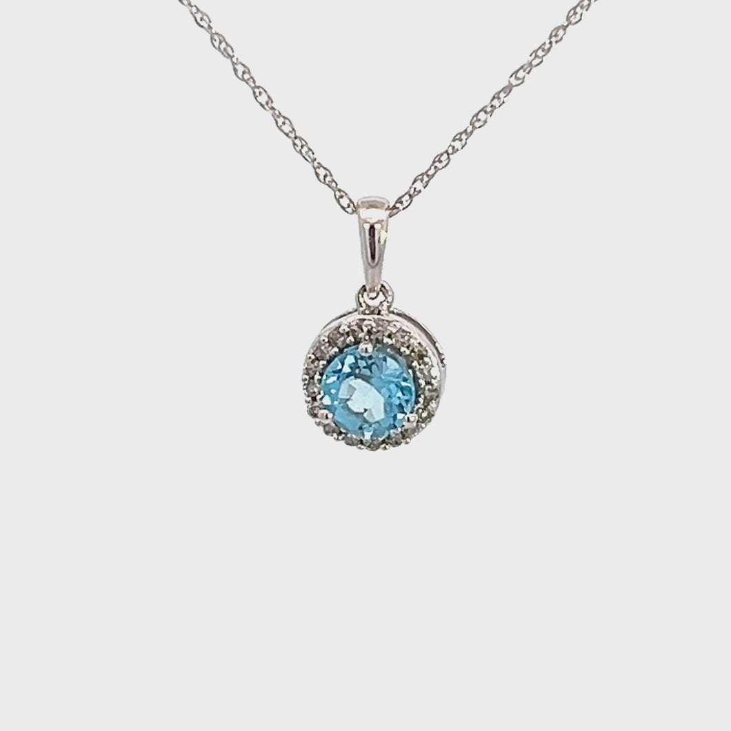 14kt White Gold Blue Topaz Pendant