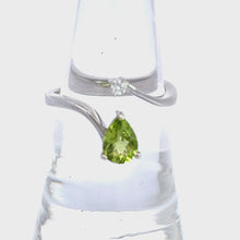 Load and play video in Gallery viewer, 14kt White Gold Peridot and Diamond Ring
