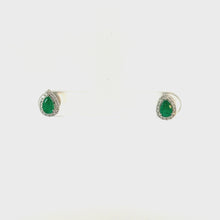 Load and play video in Gallery viewer, 18kt White Gold Emerald and  Diamond Earrings
